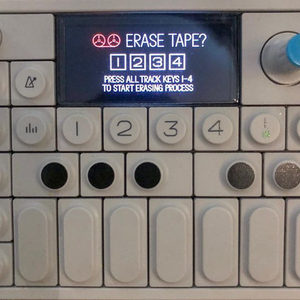 A Teenage Engineering OP-1 screen displaying Erase Tape? above four numbered track keys and black pads