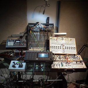 Zombie Nation studio from above: Akai MPC Live, mixing desk and Eurorack modular rack in a dark room