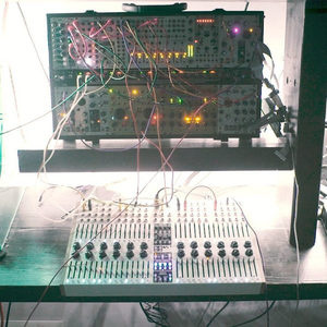 Koma Komplex Sequencer with a portable Eurorack modular, patch cables in view, Zombie Nation studio